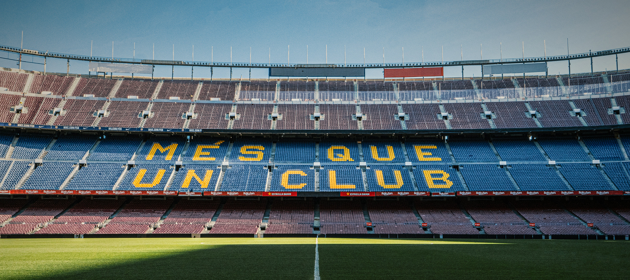 Camp Nou stadium with Més que un club spelled out in the seats