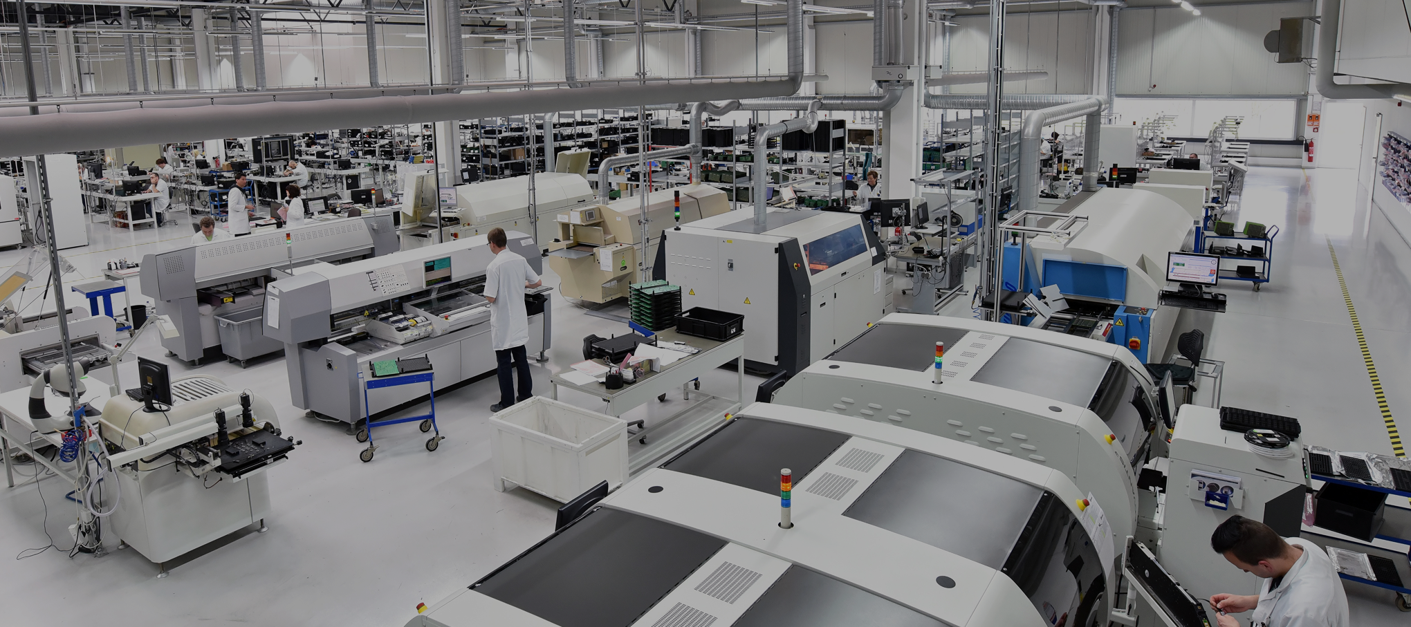 Manufacturing facility with automated machinery and operators